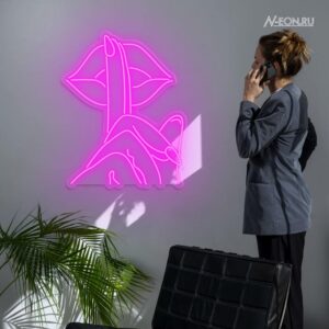 لوحة نيون - إصبع على شفاف بنية - إشارة "تسس"...